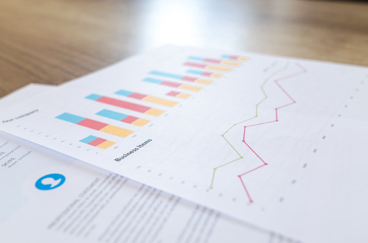 colorful graph chart laying on table