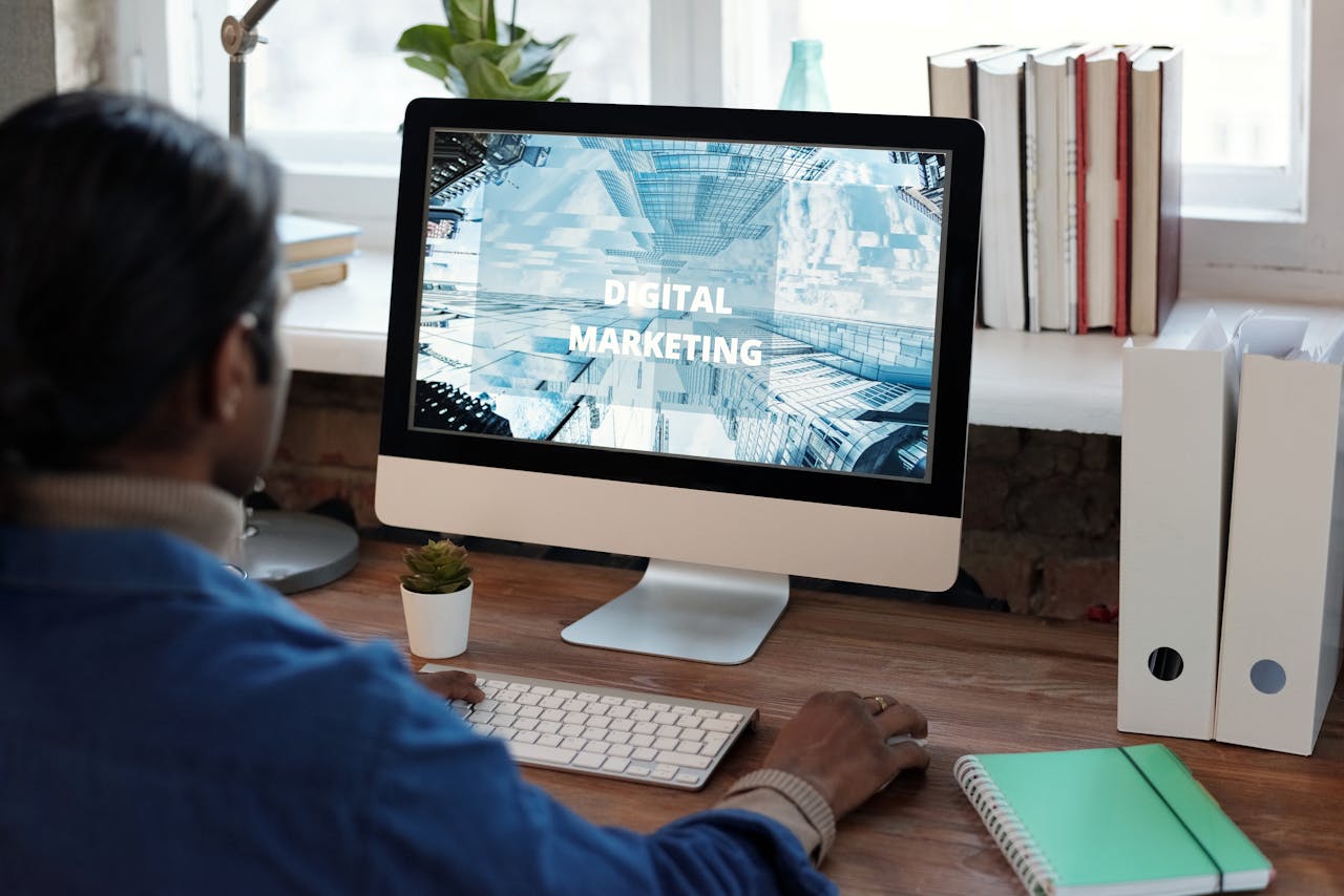 man looking at computer screen