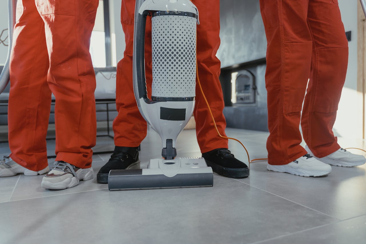 commercial cleaners preparing to polish floor